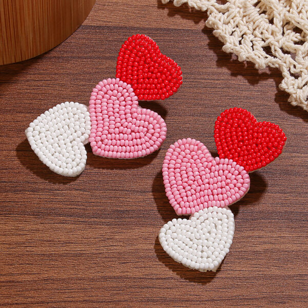 oly-182122476c566d99f033d1005cdc3b4c Wholesale fashion temperament handmade three heart rice beads irregular earrings earrings Valentine's Day