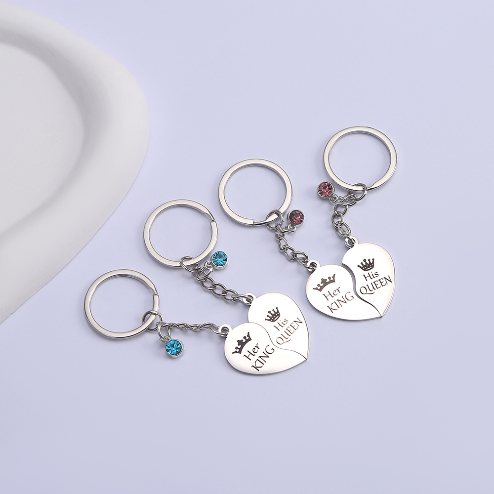 Wholesale European and American stainless steel creative keychain pendant couple's two-petal heart Diamond key ring bag ornaments