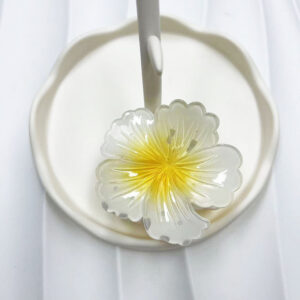 Yellow heart on white background