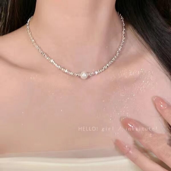 oly-18d339f12230df709203024693f45e61 Wholesale Silver Shimmering Pearl Necklace for Women - Luxurious Niche Design, Clavicle Chain, Qixi Festival Gift