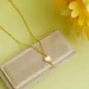 Wholesale 304 Stainless Steel Copper 18K Gold Plated Chain Heart Shape Key White Shell Zircon Pendant Necklace