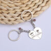oly-19568f9ef4bad62eafbd04bbf3e8908a Wholesale stainless steel creative keychain pendant couple's two-petal heart Diamond key ring bag ornaments