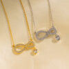 Wholesale Simple, stylish, and unique figure-eight shaped heart-shaped zircon necklace; versatile and elegant women's necklace; a Valentine's Day gift.