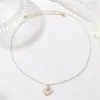 Wholesale Asymmetrical Shell Necklace For Women Featuring Copper Pendant With Electroplated Gold Plating