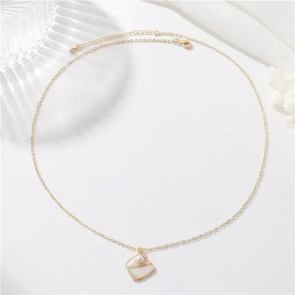 Wholesale Asymmetrical Shell Necklace For Women Featuring Copper Pendant With Electroplated Gold Plating