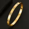 Wholesale Geometric Hypoallergenic Bangle For Women In 304 Stainless Steel With 14K Real Gold Electroplated And Rhinestone Inlay