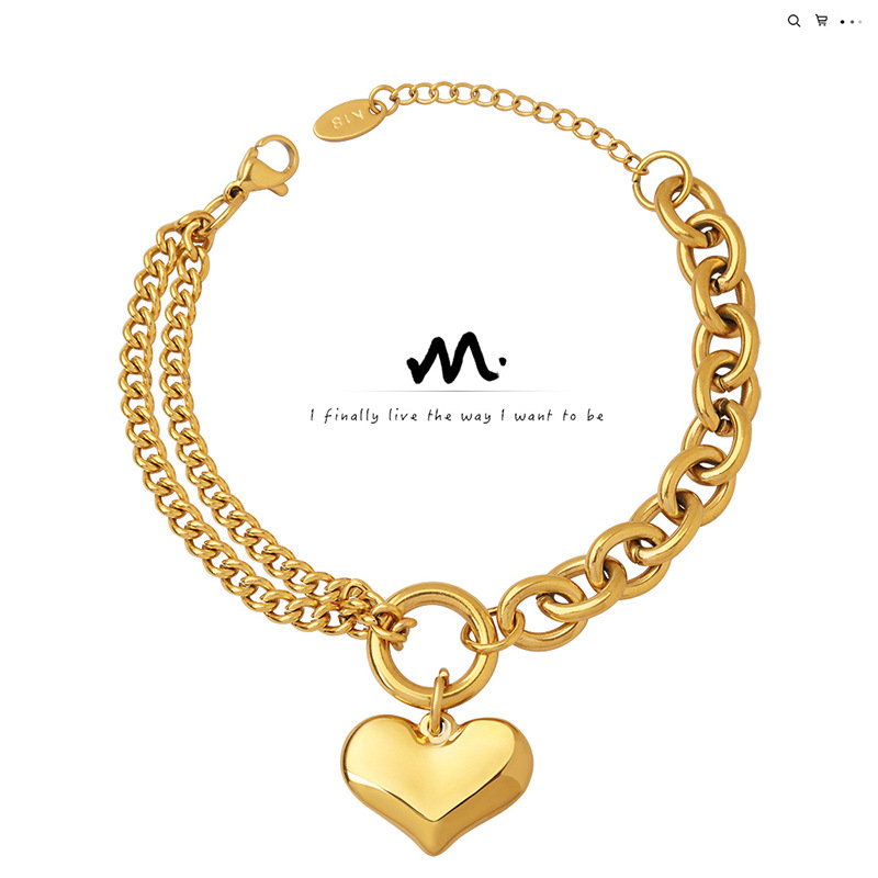 Wholesale European and American style design hand jewelry Cuban chain stitching chain love bracelet titanium steel plated 18K gold does not fade
