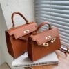 oly-1d62f317414c9c5802b9097f83d1b839 Wholesale French Niche Texture Hand Bag Women's Bag Fashionable Simple Crossbody Bag Popular Kelly Bag