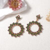 oly-1ea06116919267f09b1c31a24d5e3b9e Wholesale Carnival Simple Fashion Alloy Full Diamond Geometric Flower Flower Earrings Exquisite High-end Women