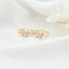 Wholesale Butterfly Ring For Women In Copper With 14K Real Gold Electroplated Finish Featuring Zircon Inlay