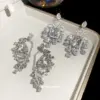 Wholesale Silver Bird Earrings For Women Featuring Copper With Zircon Inlay And 304 Stainless Steel Ear Pins