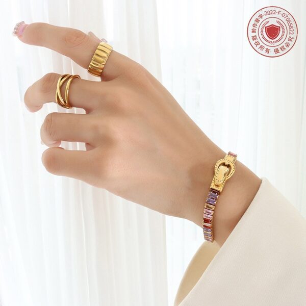oly-20577f35f0e9a85f24f80c39a8480603 Wholesale light luxury seven kinds of color zircon double-sided iron buckle design suction bracelet titanium steel gold-plated four-corner buckle jewelry