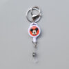 oly-227819018dcebed28dec3a7a927d72e1 Wholesale in stock cartoon glue drop retractable easy pull buckle manufacturers ID buckle round easy pull badge metal buckle