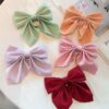 oly-22ee4c871f9c16f45bf72d198e90ed4d Wholesale pure color temperament bow hairpin college style Japanese JK ponytail clip duckbill clip girl hair accessories