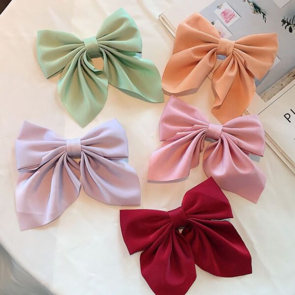 oly-22ee4c871f9c16f45bf72d198e90ed4d Wholesale pure color temperament bow hairpin college style Japanese JK ponytail clip duckbill clip girl hair accessories