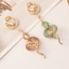 oly-23e1f8b3243f2f0646b04f268ba577a7 Wholesale Zodiac series metal diamond animal snake key chain pendant exquisite bag ornaments small gifts