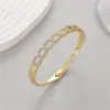 Wholesale Women’s Copper Bangle With Zircon Inlay, Electroplated With 14K Real Gold For Elegant Style