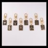 oly-2558fc3bb56f1b0072208b2ef9f0659f Wholesale Keychain Dark Series Alloy Oil Dripping Bag Pendant Exquisite Gift Metal Pendant