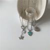 oly-255d559f6d2adf65cb40ff563407c08b Wholesale Korean blogger with Angel jelly love hollow diamond heart necklace titanium steel fashionable clavicle chain for women