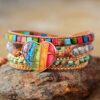 oly-2570168270c0f4dd7bc14b2f354f592e Wholesale heart-shaped 5-color natural Emperor stone leather wrapped bracelet woven multi-layer bracelet manufacturer