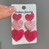 oly-25db466b6942522aa499f4a0f2fe83e9 Wholesale color matching Valentine's Day acrylic love earrings simple pendant texture dopamine earrings
