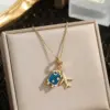 Wholesale Global Travel Rainbow Drop Oil Necklace Women's Fashion Luxury Design Sense Clavicle Chain Geometric Pattern Copper Necklace