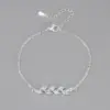 Wholesale Heart Hoops Leaf Pattern Bracelets For Women In Copper With Zircon Inlay, Available In Golden
