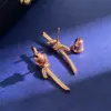 Wholesale Women’s Knot Stud Earrings With Claw Setting, 18K Real Gold Plated Brass Featuring Zircon, Water Plating Finish