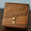 Wholesale New Sparkling Tassel Square Pendant Accessories Titanium Steel Necklace Niche Design Sense High-End Micro-Inlaid Zirconia Clavicle Chain Electroplated (Including Color Retention Layer)