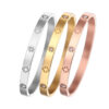 oly-2817ba8565a0176a7b12310fc1194c1f Wholesale Stainless steel electroplated four-leaf clover gold non-fading jewelry titanium steel bracelet