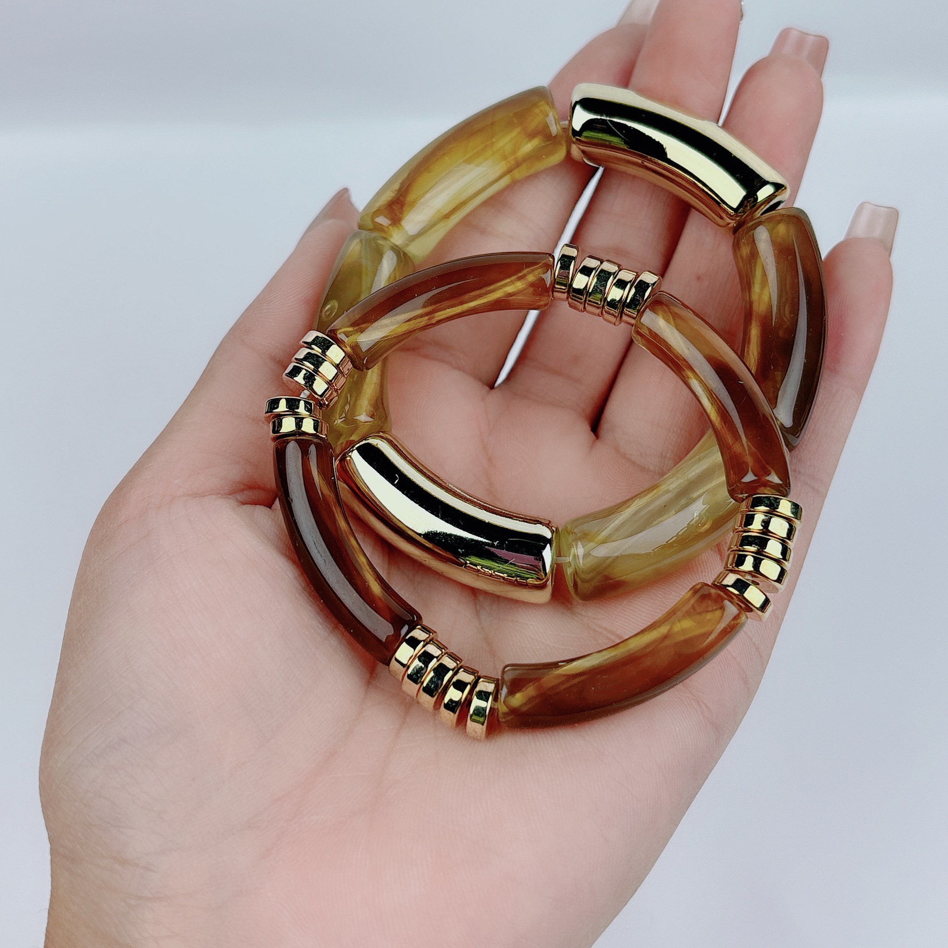 Wholesale Cross-border fashion European and American creative tube ball elastic bracelet acrylic two-color curved tube round tube bracelet