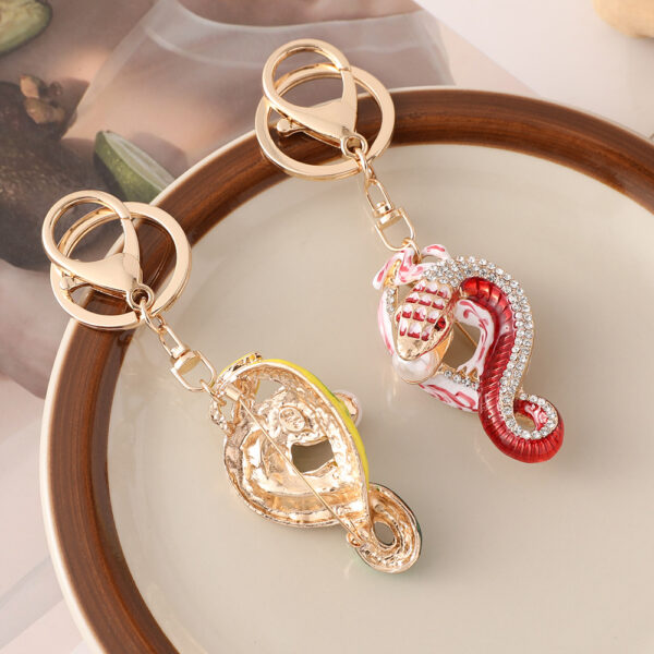 oly-290a8292cc0ec994d6b3472f461d988f Wholesale Creative Color Diamond-encrusted Zodiac Snake Car Keychain Zodiac Animal Bag Pendant Small Gift