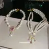 Wholesale Flowers Pendant Necklace For Women With Alloy Pendant Material Featuring Imitation Pearl And Rhinestones In White
