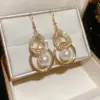 Wholesale Gold Water Droplets Ear Hook Earrings For Women In Zinc Alloy With Fish Hook Wires