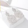 oly-2b648c2eea0378532fc2199fc17a3f99 Wholesale Fashion Earrings Vintage Hollow Disc Frosted Earrings Palace Ethnic Style Carved Earrings