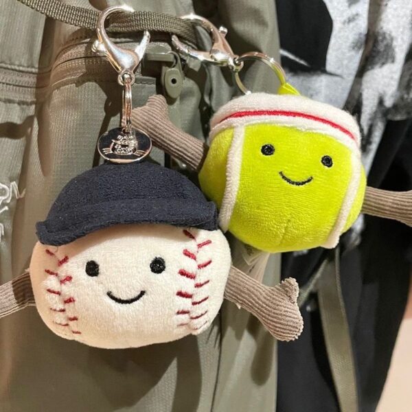 oly-2c0c3ec3c797565f584ba6cd0181bb9d Wholesale Domestic Jc Style Fun Tennis and Baseball Bag Charm Plush Doll Keychain