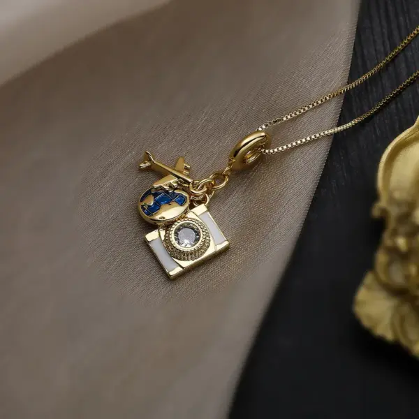 Wholesale Vacation Streetwear Earth Airplane Copper 18k Gold Plated Zircon Pendant Necklace In Bulk