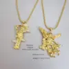 Wholesale Waterproof Non Tarnish Skull Pendant Necklace For Women In 18K Gold Plated Copper With Zircon Inlay And Snake Chain