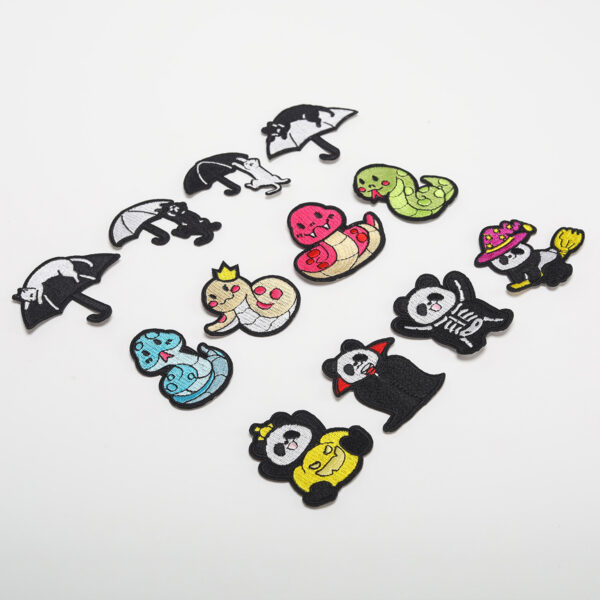 oly-2ca076d7b3e397f6dd9223157a05bb0e Wholesale Elegant Embroidery Product Computer Embroidery Sticker Small Snake Cloth Sticker Original Black Cat Patch Sticker Magic Panda Bag Decorative Decal