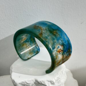 Translucent blue-green smudge