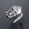oly-2e76d248466ac3d9f0c7e882a998588b Wholesale Retro Titanium Steel Monster Ring Unique Creative Horned Dominant Finger Ring For Men Cartoon Pattern Polished Skull Head