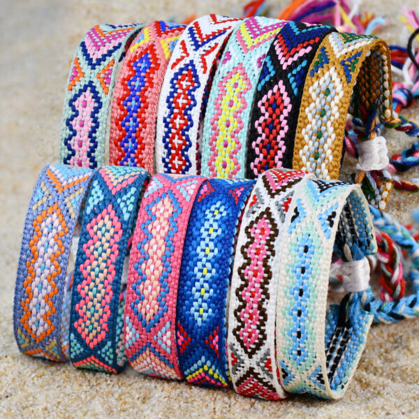 oly-2ea62336410df1818cb667b55eef33f1 Wholesale Nepal ethnic style hand-woven bracelet women's colorful tassel lucky friendship hand rope jewelry