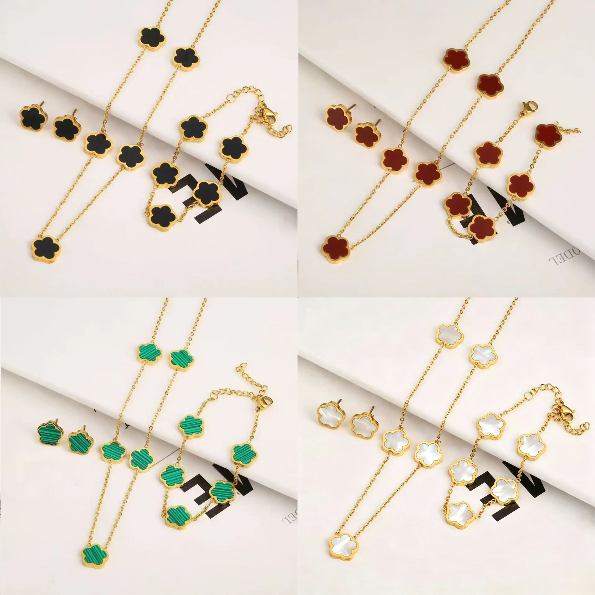 Wholesale Electroplated stainless steel lucky five-leaf clover petal earrings, bracelet, and necklace set