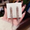 Wholesale Korean version of diamond-encrusted fairy earrings fashion high-end wholesale net red temperament super fairy tassel face thin earrings exaggerated