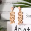 oly-309c6fa16f412f57974b8f489ed5a092 Wholesale New Jewelry American Independence Day Bead Earrings Women's Style Letter Alphabet Alloy Personality Hoops