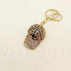 oly-32bb310ac667c0ef5fa4970039cfe419 Wholesale cute hat key chain wholesale diamond cartoon baseball cap metal key pendant ornaments small merchandise