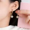 Wholesale Titanium steel four-leaf clover necklace, fresh clavicle chain, earrings and bracelet set