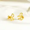 Wholesale Asymmetrical Bow Tie Stud Earrings For Women In 304 Stainless Steel With 18K Real Gold PVD Coated Plating And 0.03µm Thickness