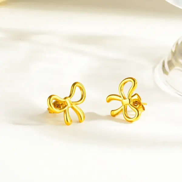 Wholesale Asymmetrical Bow Tie Stud Earrings For Women In 304 Stainless Steel With 18K Real Gold PVD Coated Plating And 0.03µm Thickness