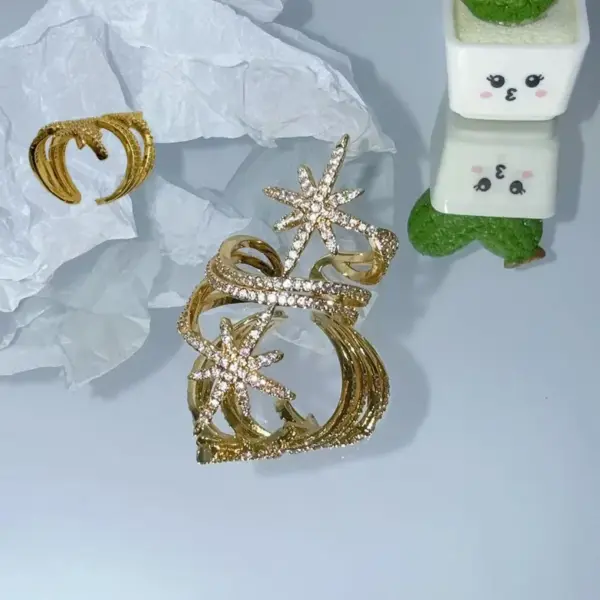 Wholesale Fashion Light Luxury INS Style Copper Color Retention Electroplated Micro Inlaid Zircon Eight-Pointed Star Ribbon Light Open Ring Water Plated 18K Real Gold